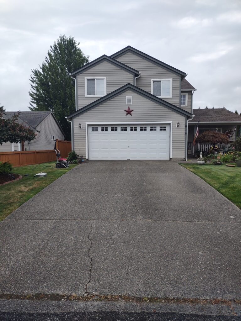 This is a dirty aggregate concrete driveway